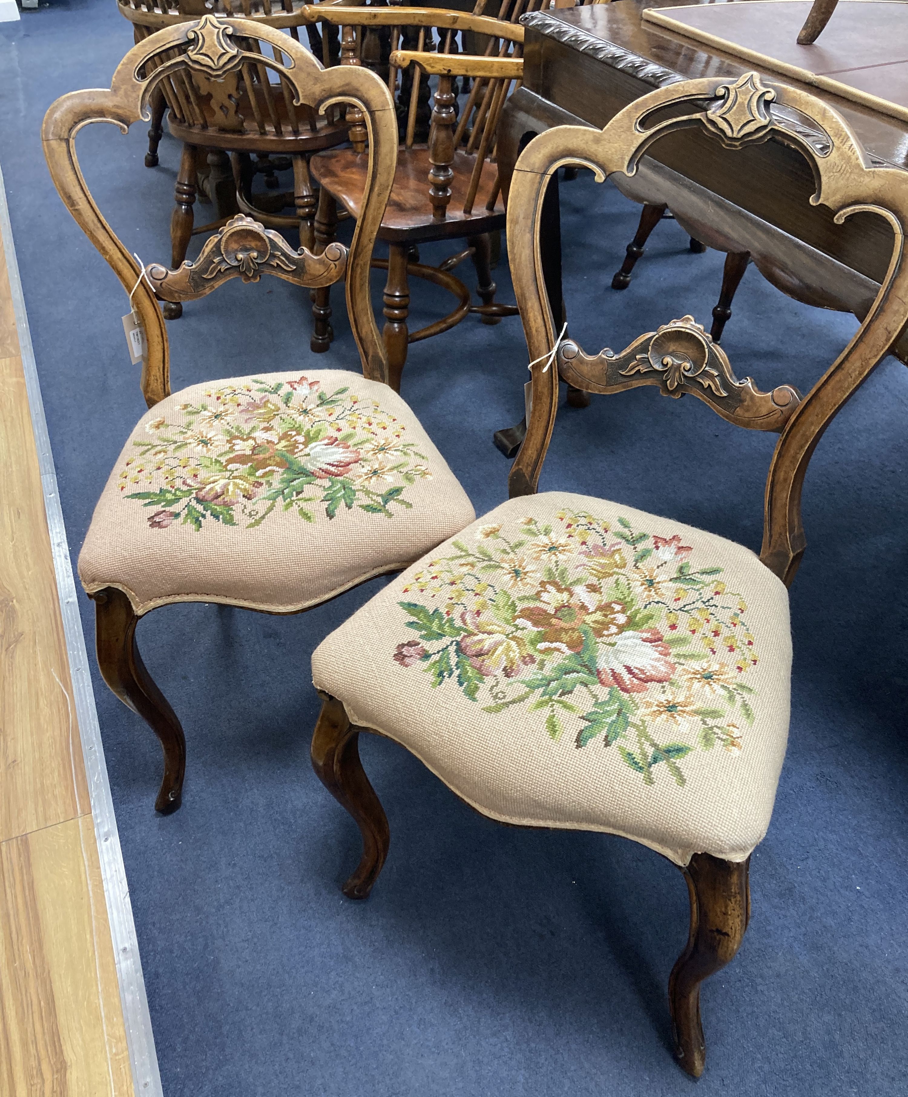 A pair of Victorian walnut side chairs
