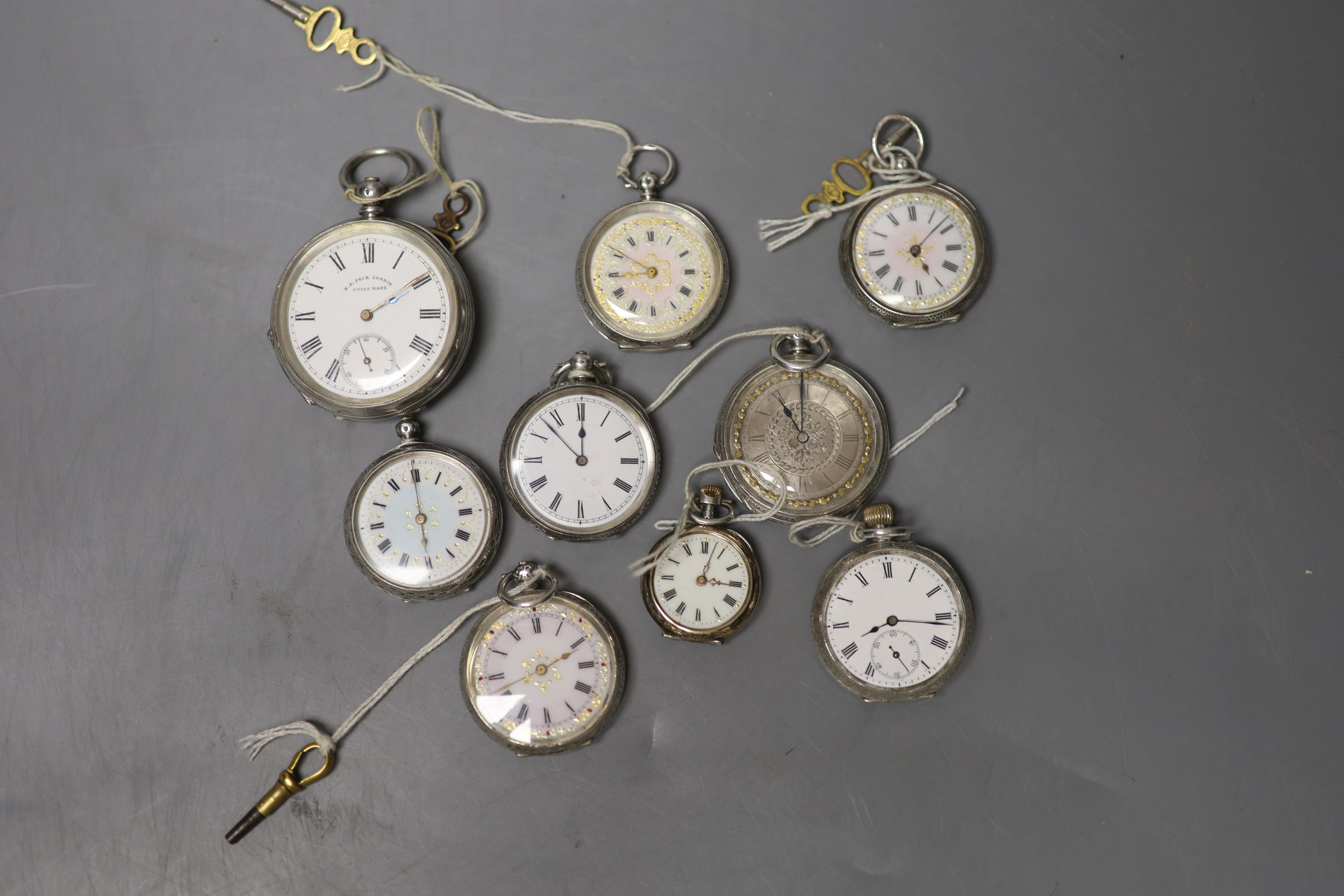 A Swiss 935 open faced pocket watch, retailed by Peck, London, case diameter 48mm, together with