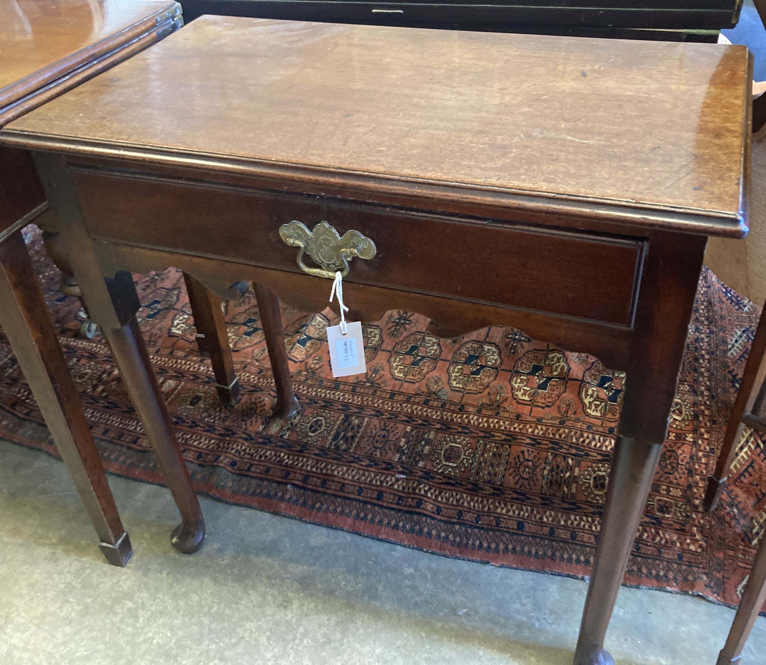 A George II mahogany side table fitted drawer on plain turned legs and pad feet, width 70cm, depth