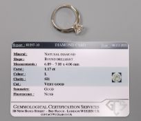 A modern platinum and solitaire diamond ring, with accompanying GCS report dated 8/3/2021, stating