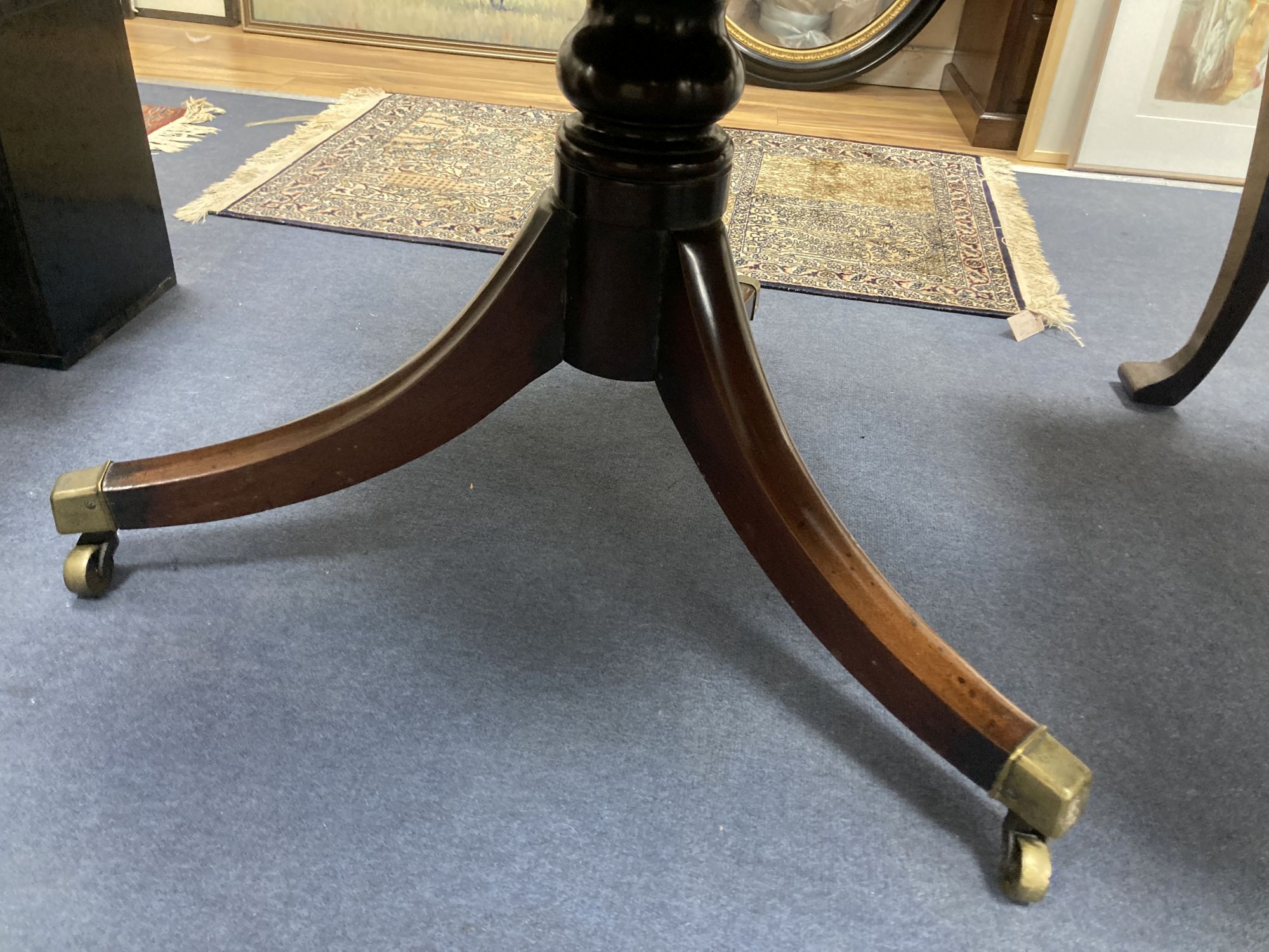 A Regency mahogany drum top library table, fitted four frieze drawers on ring turned stem and - Image 5 of 6