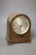 A Bulle oak cased electric mantel clock, height 22cm