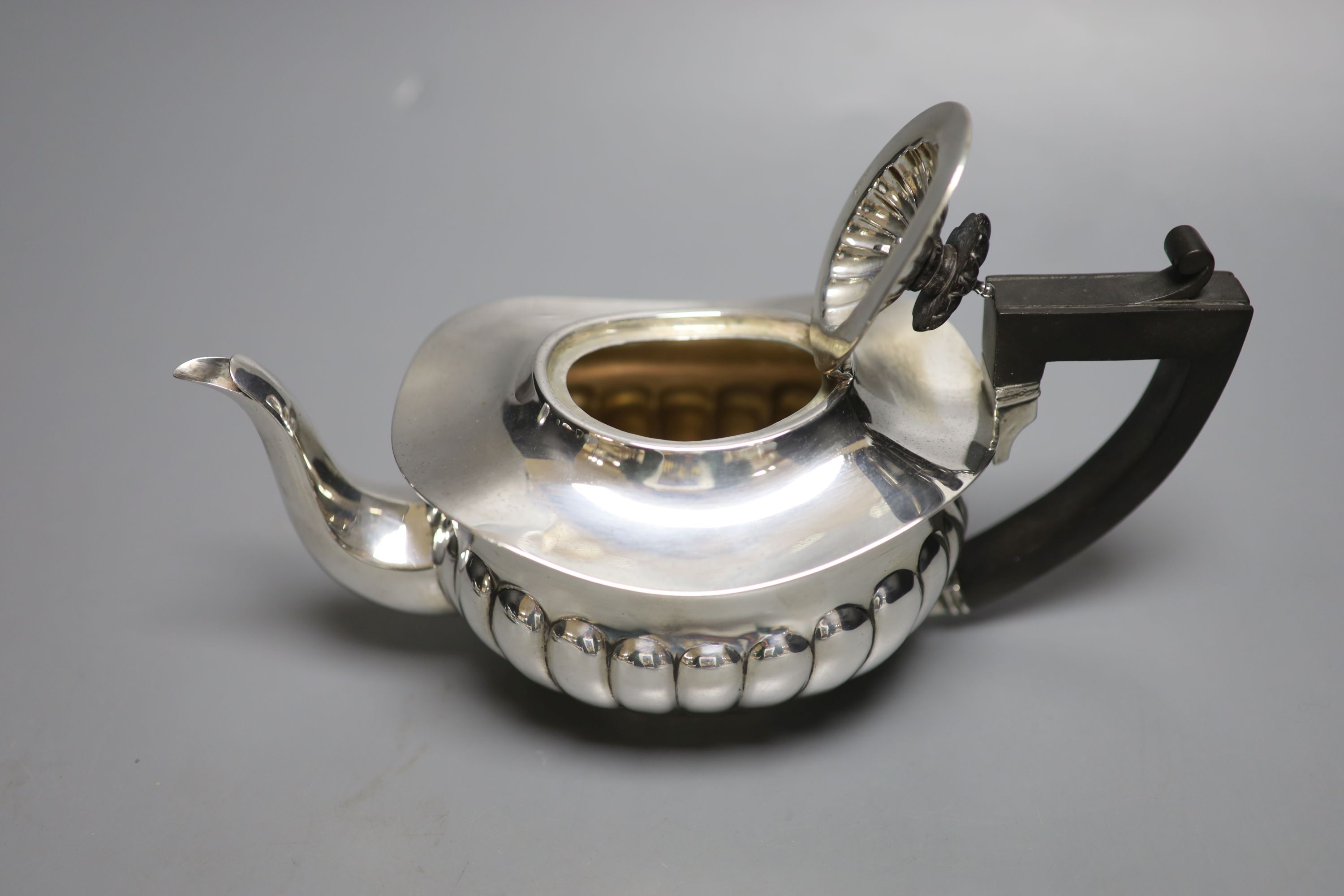 An Edwardian silver three-piece tea service, by Joseph Gloster, of oval half-reeded form, Birmingham - Image 4 of 4