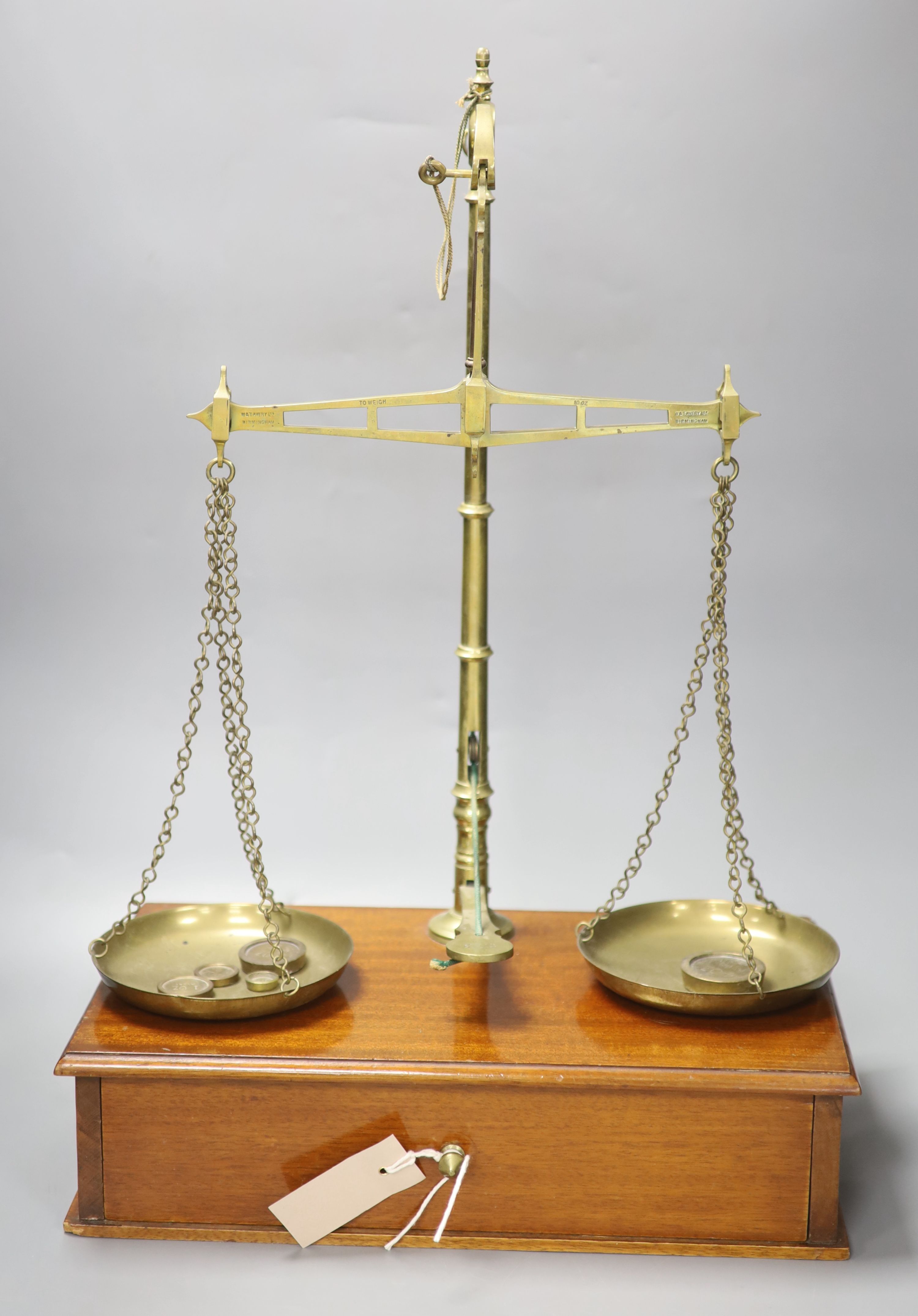 A set of late Victorian Avery scales, cased, 57cm high
