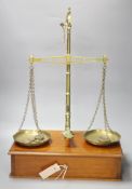 A set of late Victorian Avery scales, cased, 57cm high