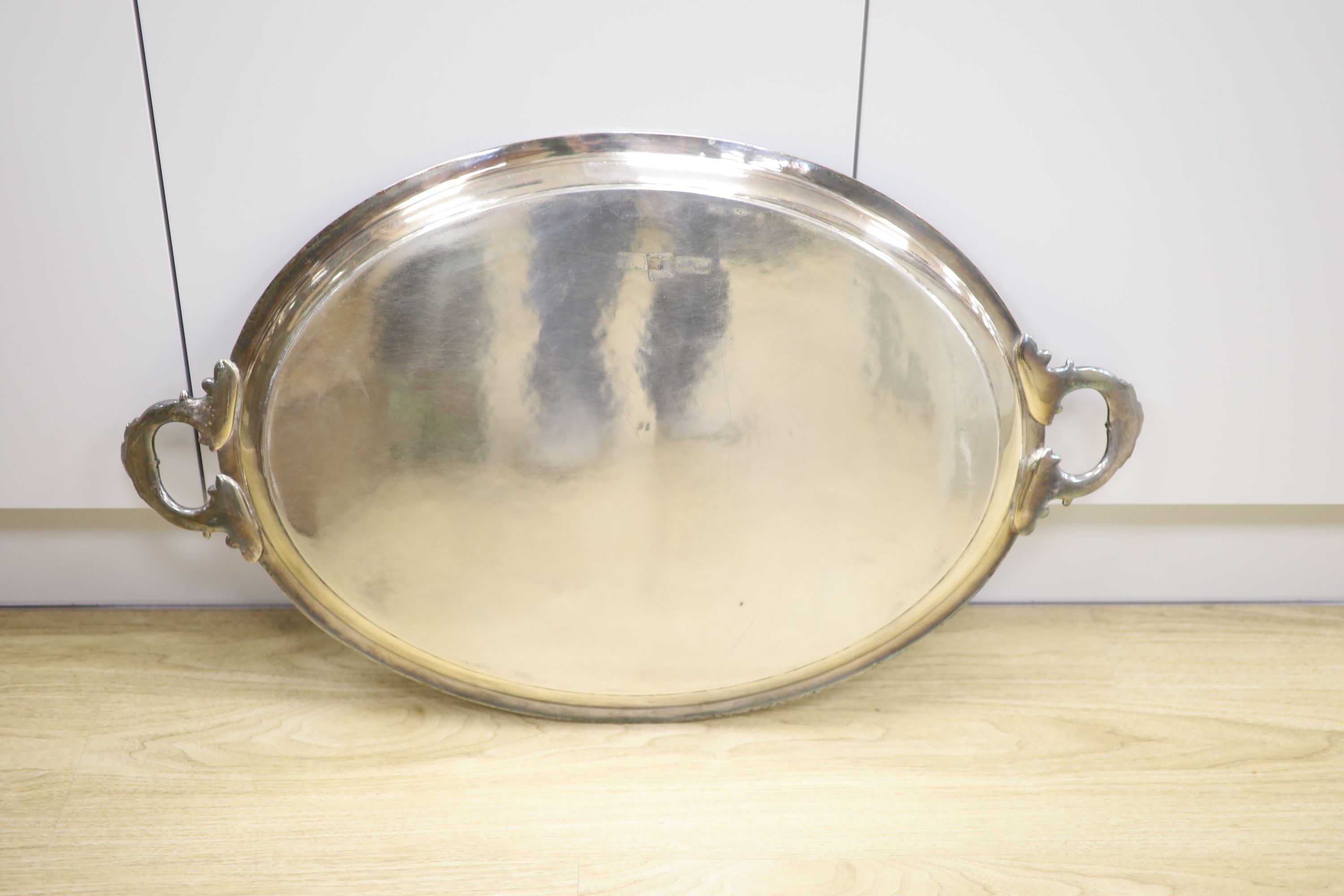 A Victorian silver plated oval two handled tea tray, 78cm. - Image 2 of 2