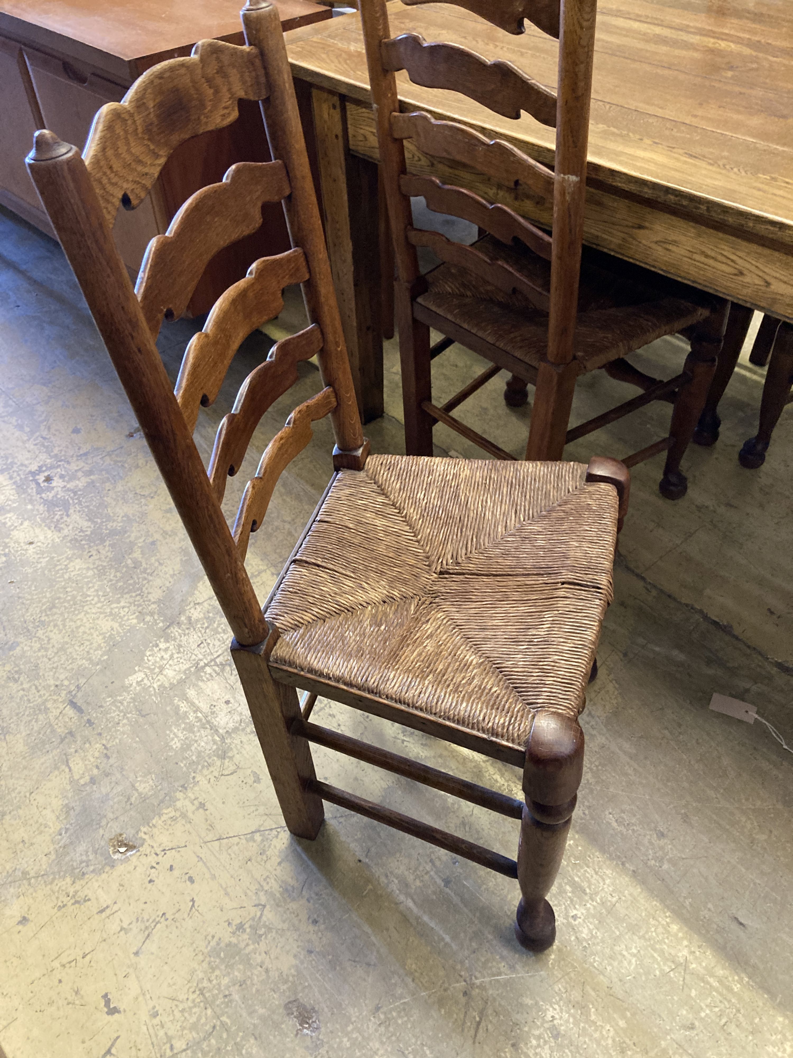 A set of six ladderback dining chairs with rush seats, two having arms - Image 6 of 7