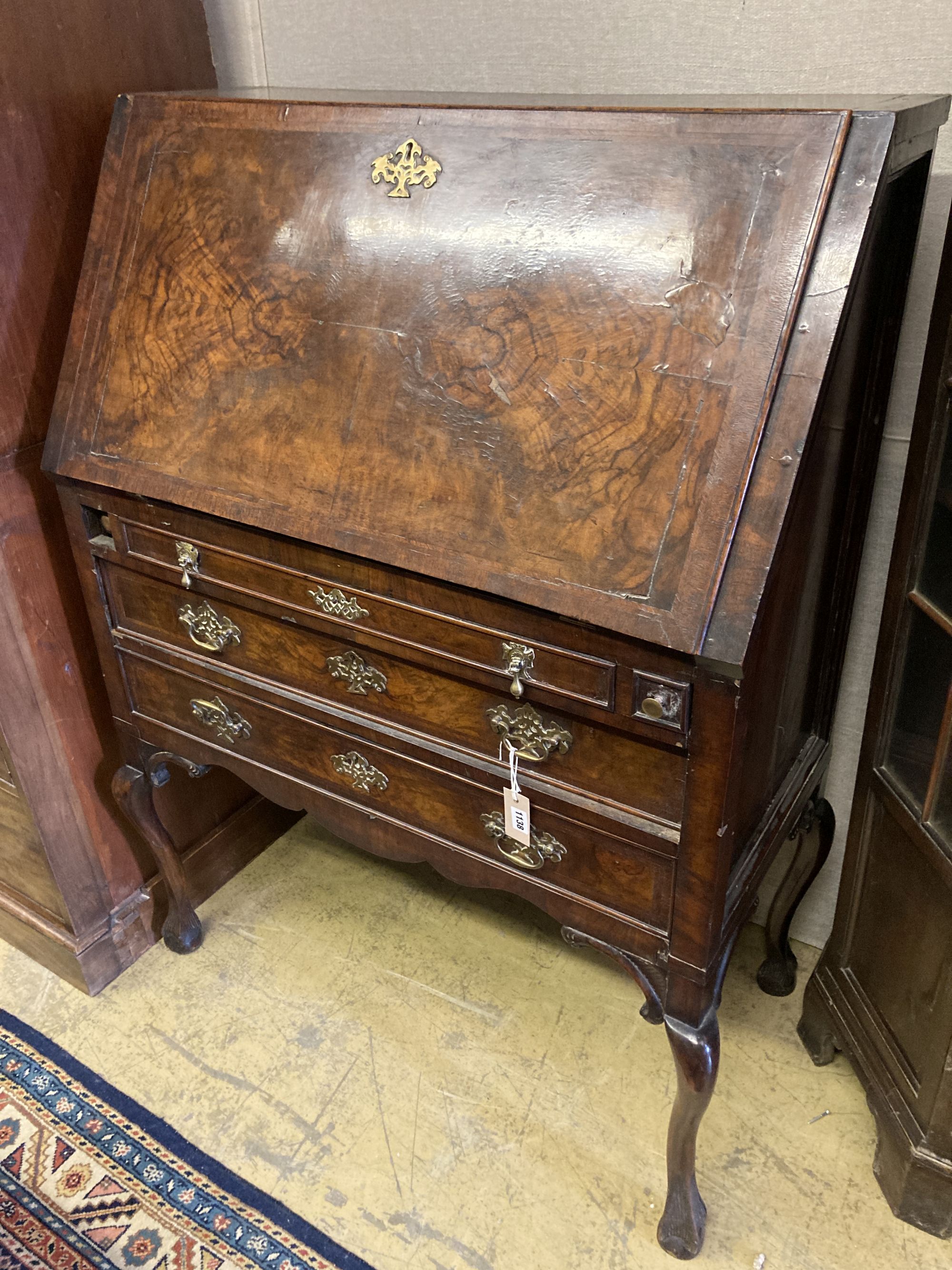 A Queen Anne revival figured walnut bureau, width 94cm depth 48cm height 130cm