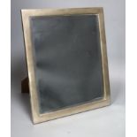 A sterling mounted wooden backed rectangular easel mirror, 39.7cm.
