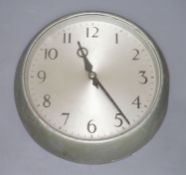 A metal cased circular slave clock, the reverse inscribed GPO