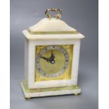 An Elliott onyx mantel clock, retailed by Asprey & Co., height 19cm