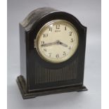 A Bulle electric ebonised mantel clock, height 20cm
