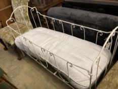 A 19th century French painted wrought iron crib, length 140cm, depth 59cm, height 90cm