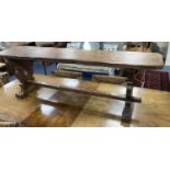 A 17th century style oak bench, length 138cm, depth 29cm, height 44cm