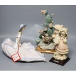 Two G Armani porcelain sculptures and a Nao figure of a lady
