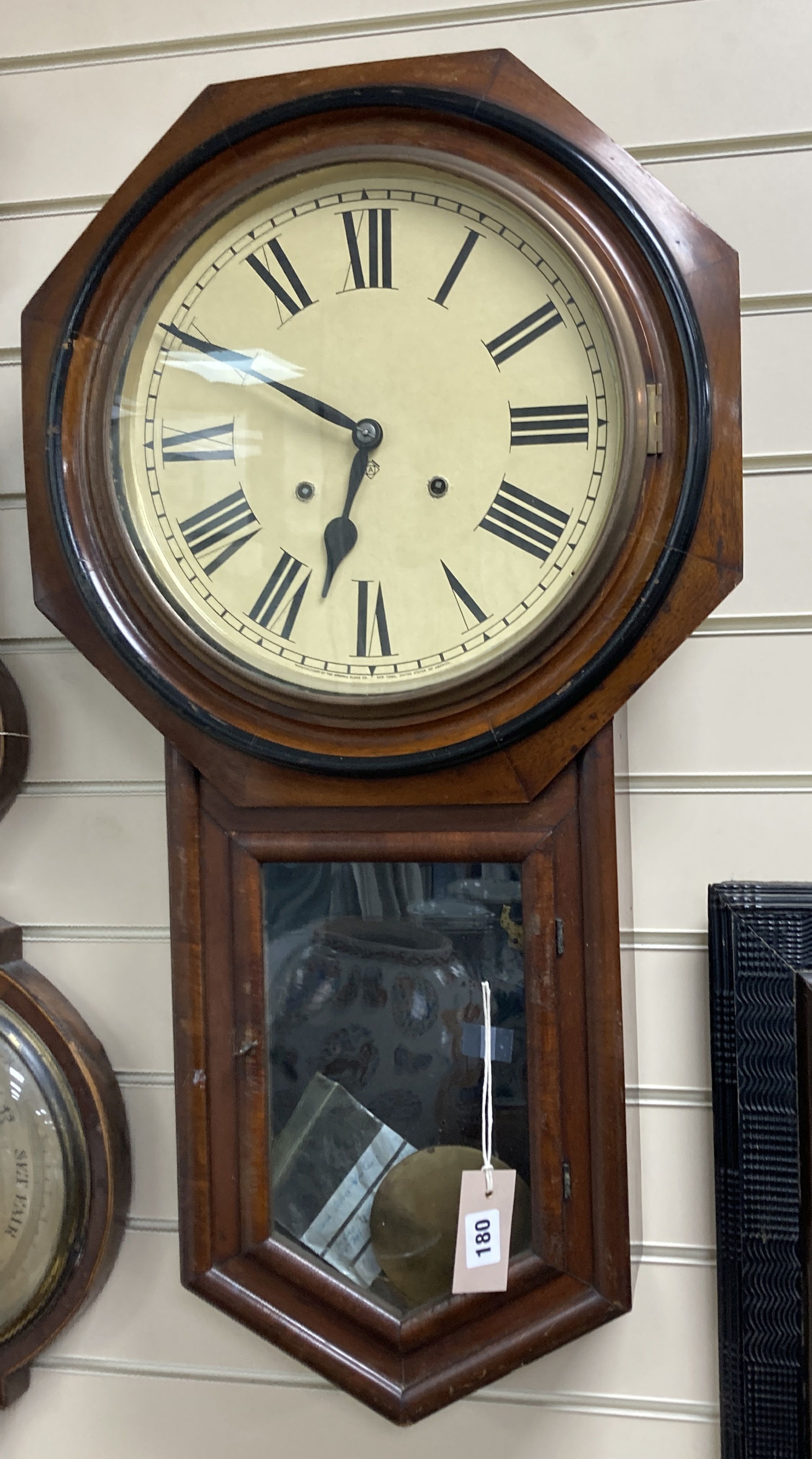 A 19th century American wall clock, height 80cm
