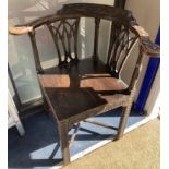 A George III carved mahogany corner elbow chair, width 76cm, depth 64cm, height 82cm