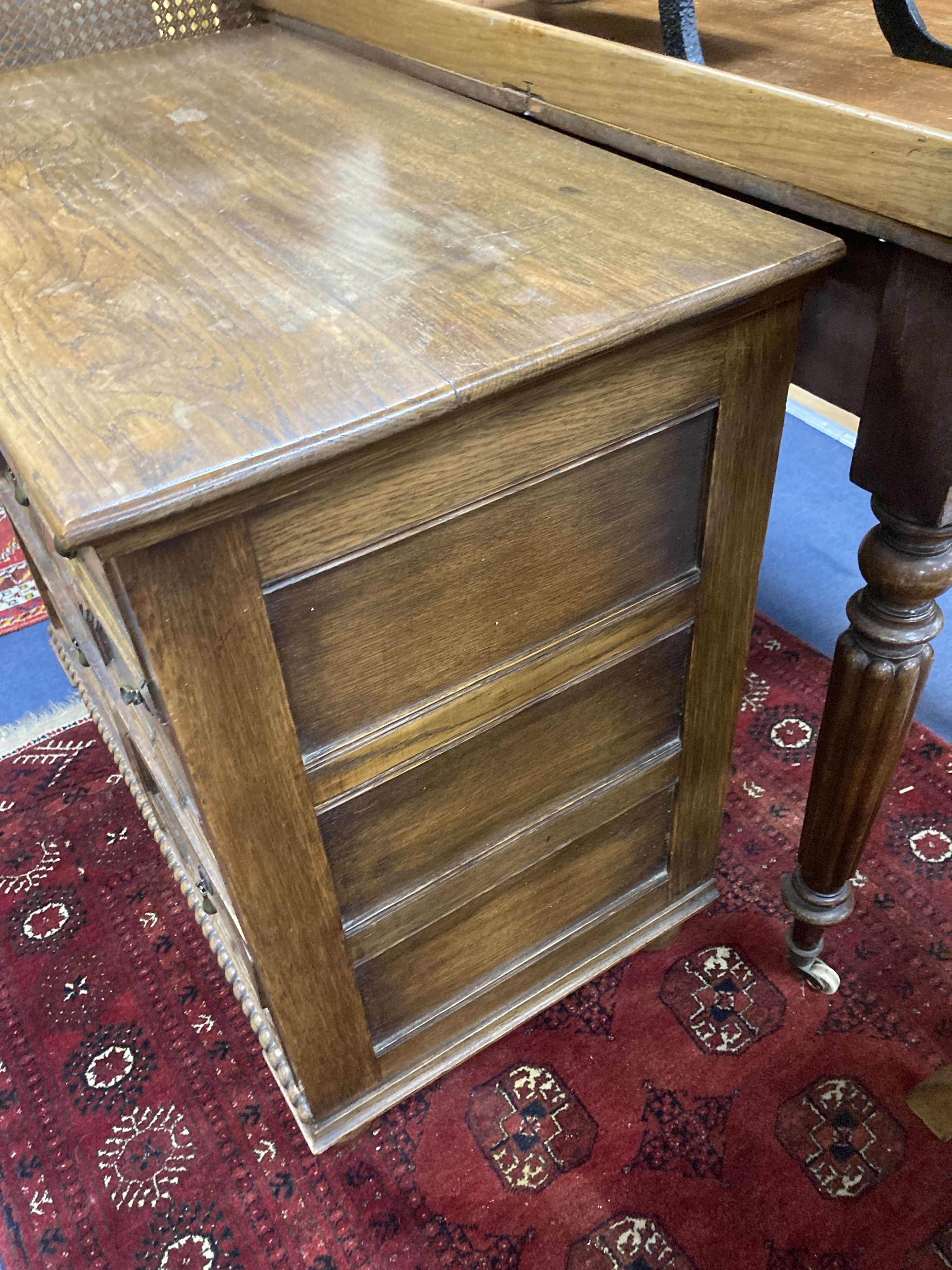 An early 20th century Jacobean style oak four drawer chest, width 81cm, depth 46cm, height 76cm - Image 3 of 4