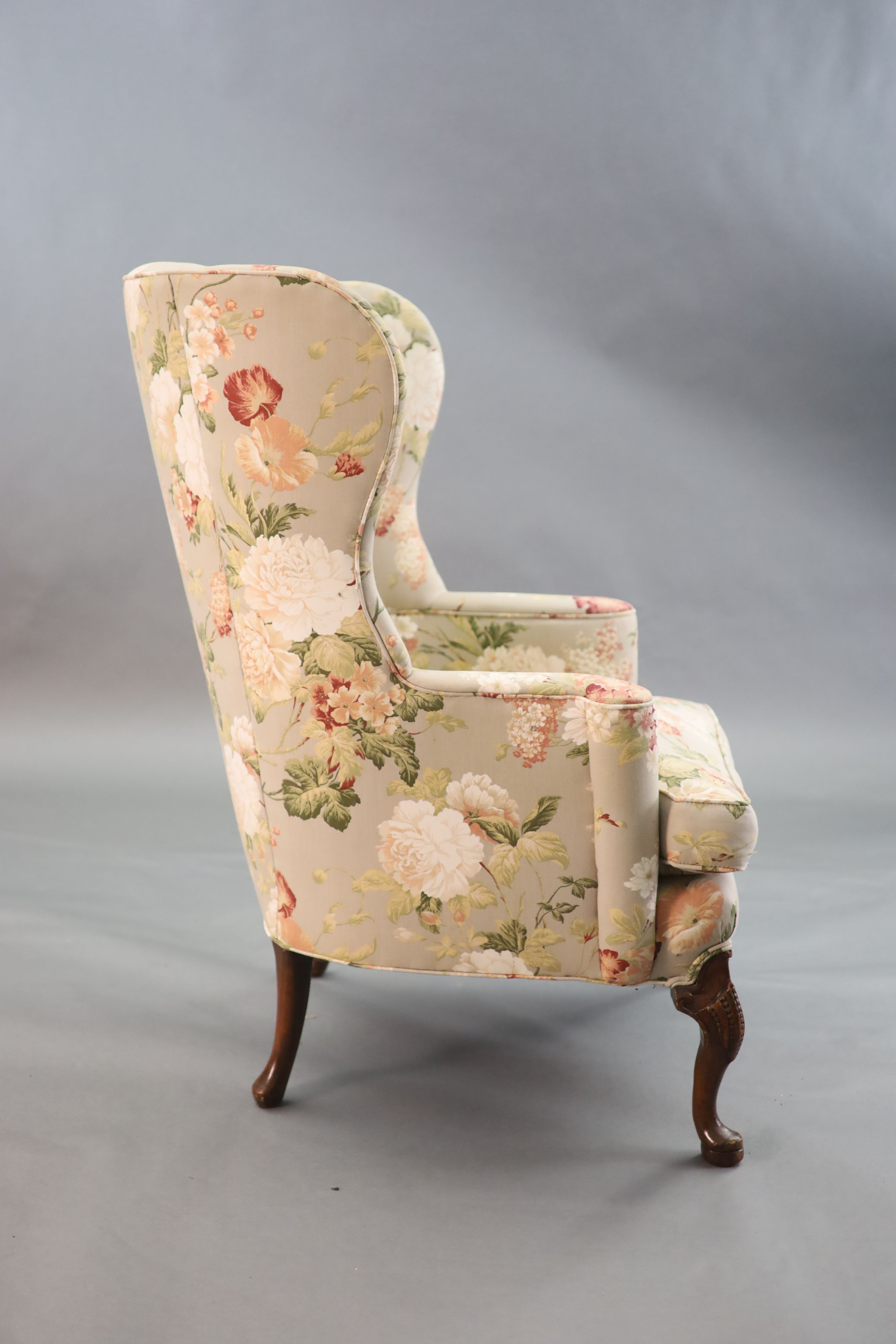 A French Hepplewhite style wing armchair together with a matching contemporary footstool - Image 4 of 9