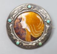 An early 20th century French white metal and turquoise mounted Limoges? enamel circular brooch,