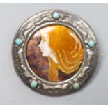 An early 20th century French white metal and turquoise mounted Limoges? enamel circular brooch,