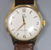 A gentleman's early 1960's 9ct gold Tudor Royal manual wind wrist watch, on associated leather