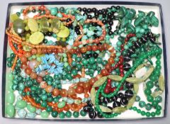 A quantity of assorted necklaces including banded agate, malachite and turquoise.
