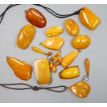 A group of assorted amber jewellery including, earrings, brooches and pendants, gross weight 136