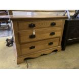 A late Victorian oak chest of three drawers, width 106cm, depth 55cm, height 81cm