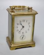 A late 19th century French brass cased eight day carriage timepiece with incorporated alarm,