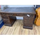 A late Victorian mahogany pedestal desk, length 132cm, depth 73cm, height 77cm