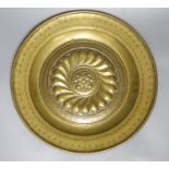 A 17th century Nuremberg brass alms dish, diameter 43cm