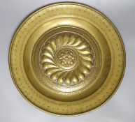 A 17th century Nuremberg brass alms dish, diameter 43cm