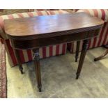 A Regency D shape mahogany folding tea table, width 93cm, depth 45cm, height 74cm
