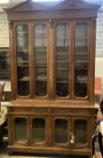 A Victorian oak library bookcase, length 160cm, depth 54cm, height 280cmCONDITION: The cornice is