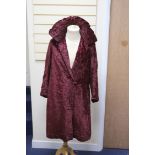 A 1920's silk velvet evening coat, length 100cm