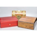 A Garrard rosewood and brass bound dome-topped box, a red leather humidor and a mahogany jewellery