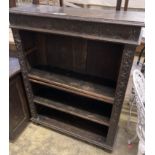 A late Victorian carved oak open bookcase, length 92cm, depth 31cm, height 115cm
