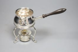 An Edwardian silver brandy warmer, on stand with burner, Henry Stratford, London, 1903, height 14.