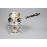 An Edwardian silver brandy warmer, on stand with burner, Henry Stratford, London, 1903, height 14.