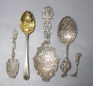 A late Victorian ornate pierced spoon, Thomas Hayes, Birmingham, 1891, 23.8cm, two Dutch? white