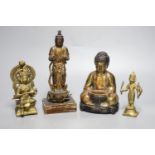 A Japanese gilt lacquered standing Buddha, a gilt copper Buddha and two Indian figures, tallest