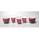 Four Chinese ruby ground cups, and a similar pair of cups, height 6cm (6)