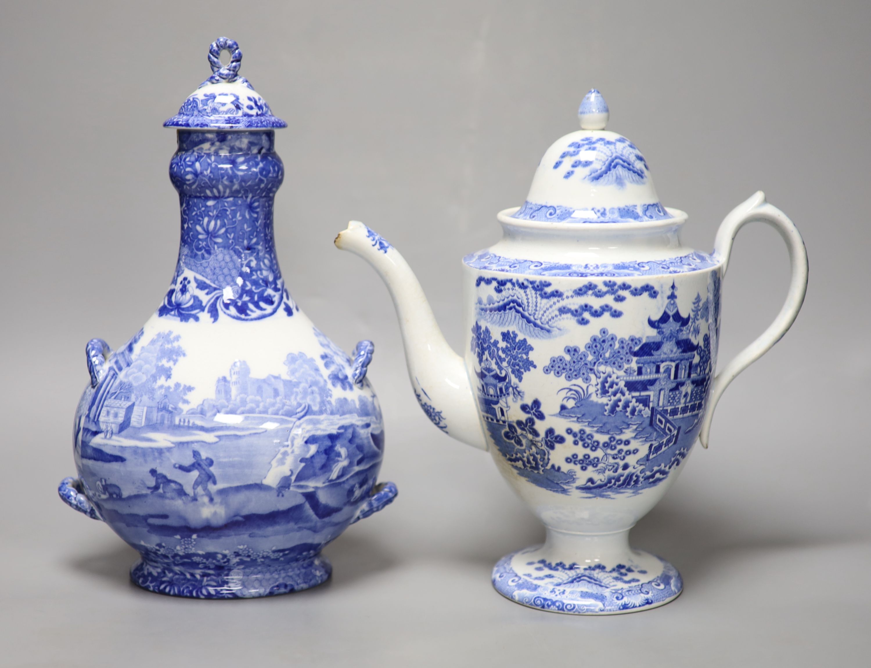 A Staffordshire pearlware blue and white pottery coffee pot and a Copeland Spode pilgrim flask,