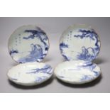 A set of four 17th century Japanese Arita blue and white plates, diameter 21cm