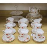 A Colclough floral decorated fifty nine piece part tea service