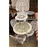 A circular Victorian style painted aluminium garden table, diameter 69cm together with a set of four