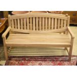 A brand new teak garden bench, length 150cm, depth 62cm, height 92cm