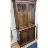 A Victorian mahogany bookcase / cupboard, width 97cm, depth 46cm, height 214cm