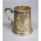 A George VI silver mug, Cooper Brothers & Sons, Sheffield, 1942, 12.2cm, 11oz.CONDITION: Quite